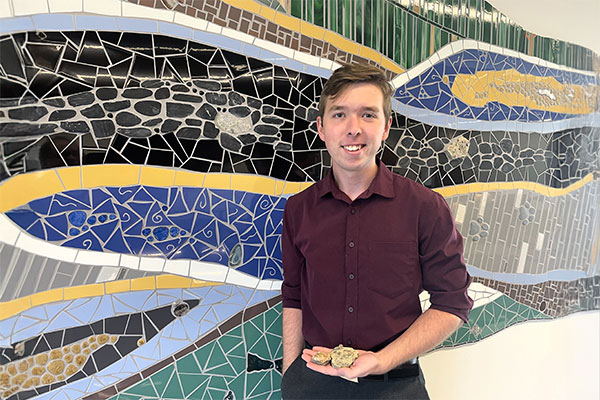 colton swauger with rocks